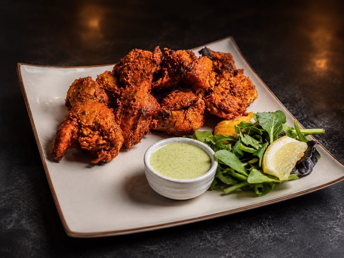 Boneless chicken tikka with mint sauce and salad