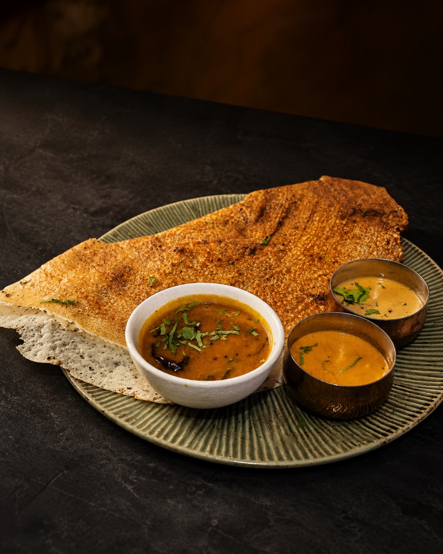 Crisp golden dosa with chutneys